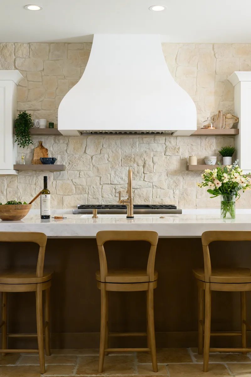 custom-made-48-inch-hood-in-white-with-built-in-blowers-sits-above-slide-in-gas-range