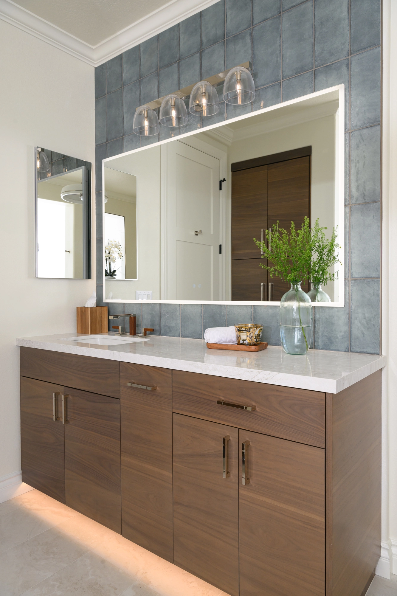 Lighted mirrors are popular in 2026 bathroom remodeling trends in Orange County